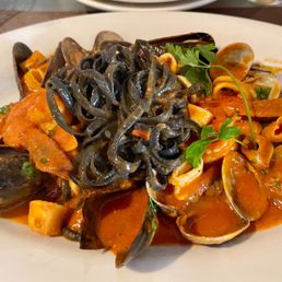 Alessandro’s Italian Restaurant signature dishes Tiramisu, Rigatoni Rocco, Bucatini & Clams.